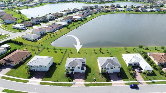 a view of outdoor space with playground and green space