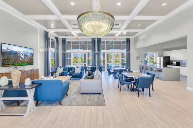 a view of a swimming pool with an outdoor seating