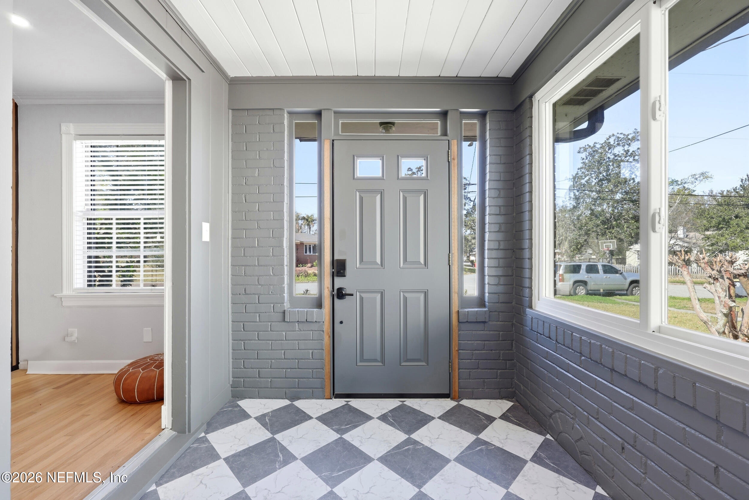 813 Old Hickory Road Jacksonville, FL 32207 - Photo 3 of 28 a view of a room that has a window and wooden floor