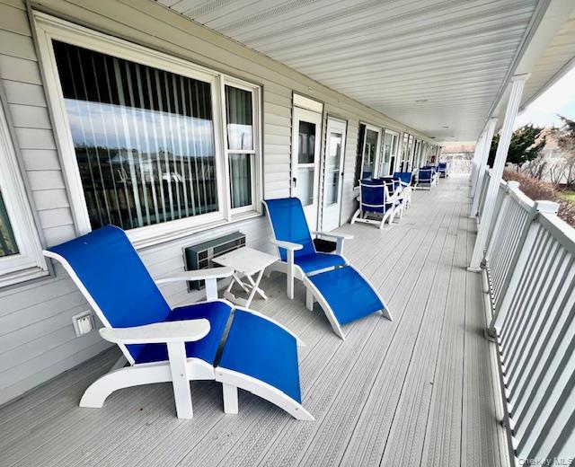 231 Dune Road, Unit 905 Westhampton Beach, NY 11978 - Photo 17 of 24 Porch in front of unit