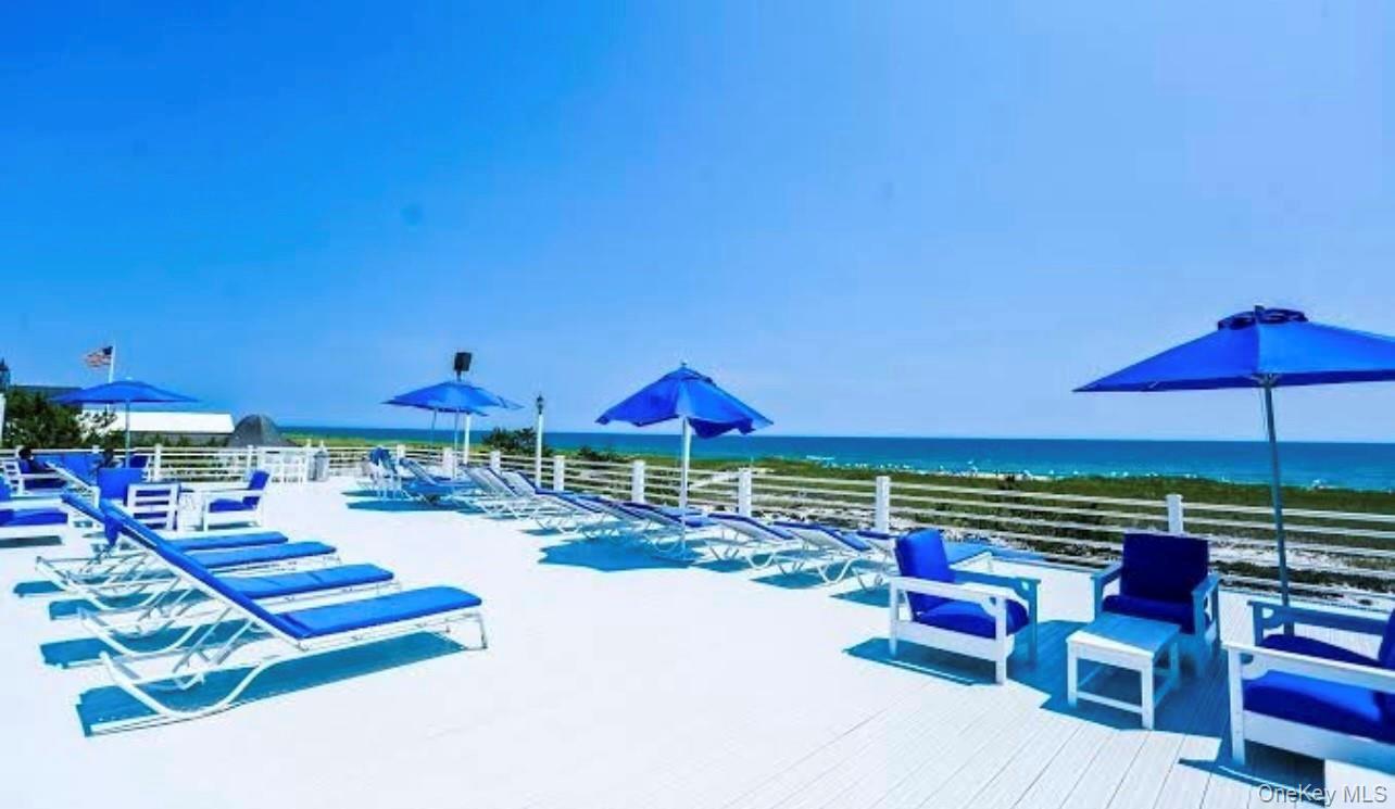 231 Dune Road, Unit 905 Westhampton Beach, NY 11978 - Photo 19 of 24 Plenty of lawn chairs