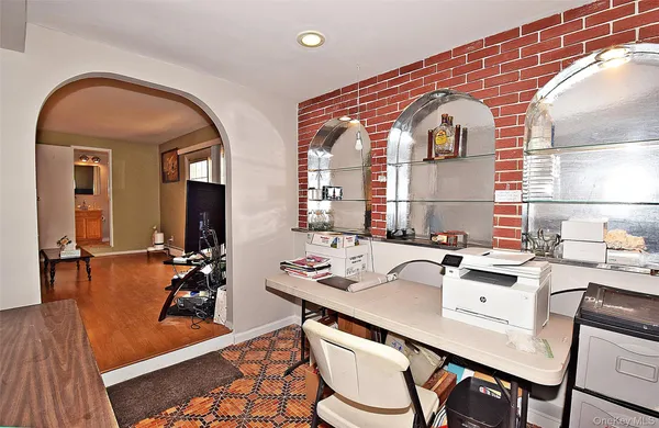 a kitchen with a sink appliances and cabinets