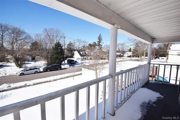 a view of a porch and a yard