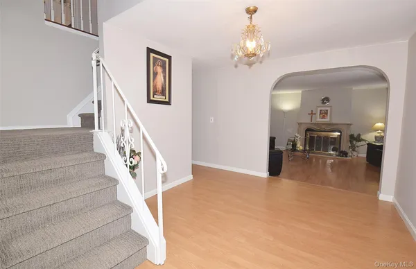 a view of a hallway view with staircase