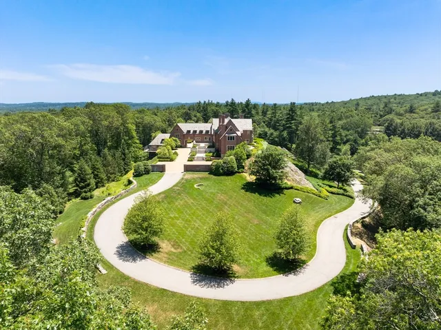 a view of a swimming pool in a backyard