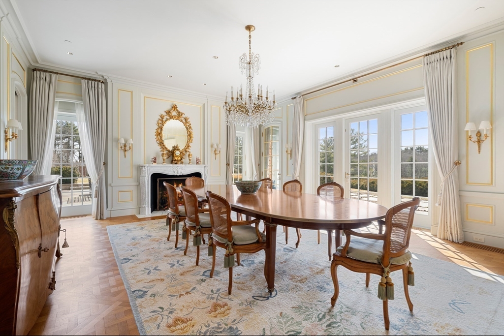 4 Willow Road Weston, MA 02493 - Photo 15 of 42 a view of a dining room with furniture window and wooden floor