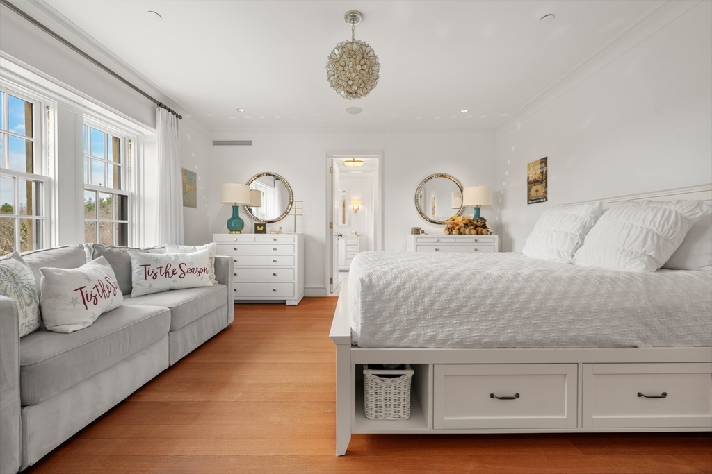 4 Willow Road Weston, MA 02493 - Photo 28 of 42 a living room with furniture and a mirror