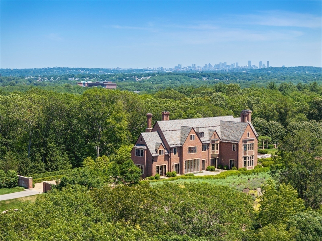 4 Willow Road Weston, MA 02493 - Photo 42 of 42 an aerial view of a house with a big yard and large trees