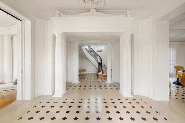 a bedroom with a bed and a view of bathroom