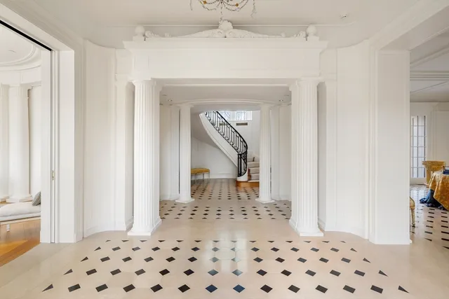a bedroom with a bed and a view of bathroom