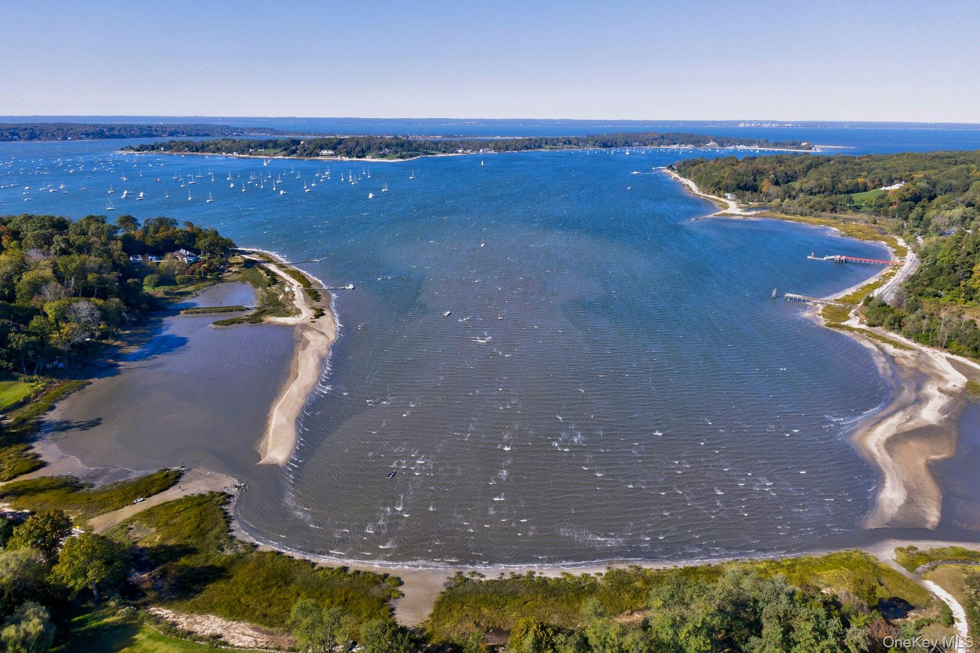 126 Cove Road Oyster Bay, NY 11771 - Photo 2 of 42 Aerial view of property and surrounding area with a large body of water