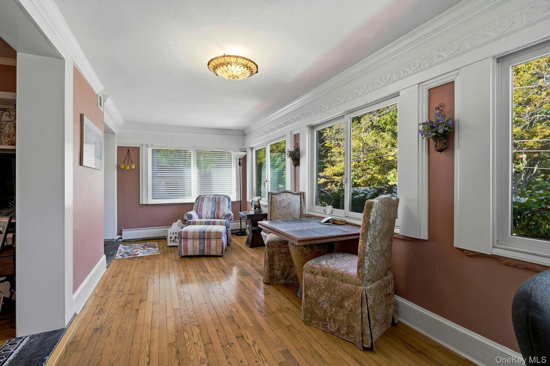 126 Cove Road Oyster Bay, NY 11771 - Photo 29 of 46 a living room with furniture and a window