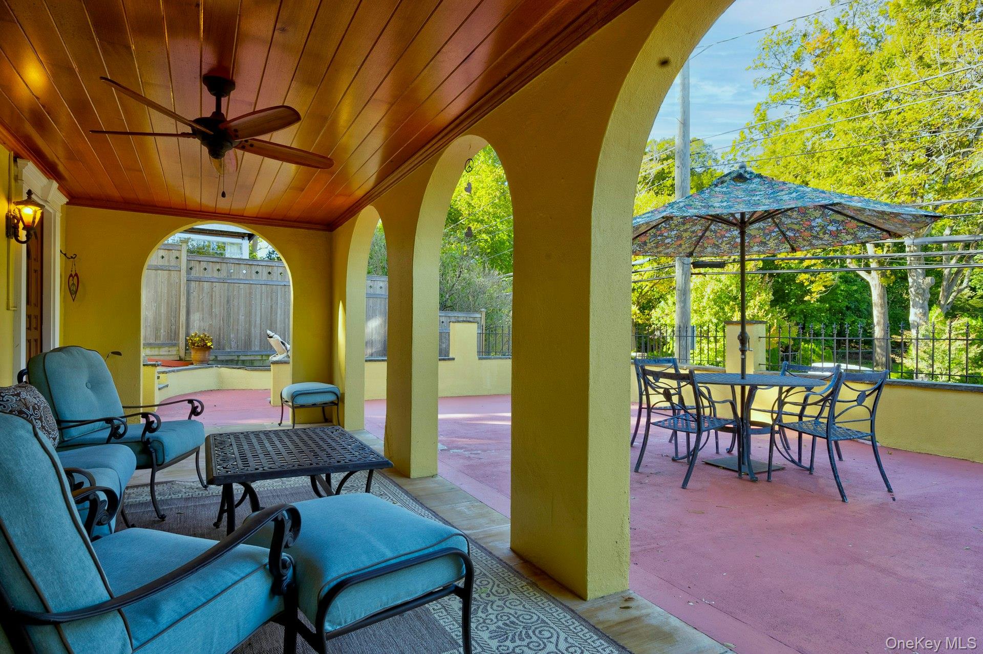 126 Cove Road Oyster Bay, NY 11771 - Photo 3 of 42 View of patio / terrace with a wood and ceiling fan and outdoor dining space