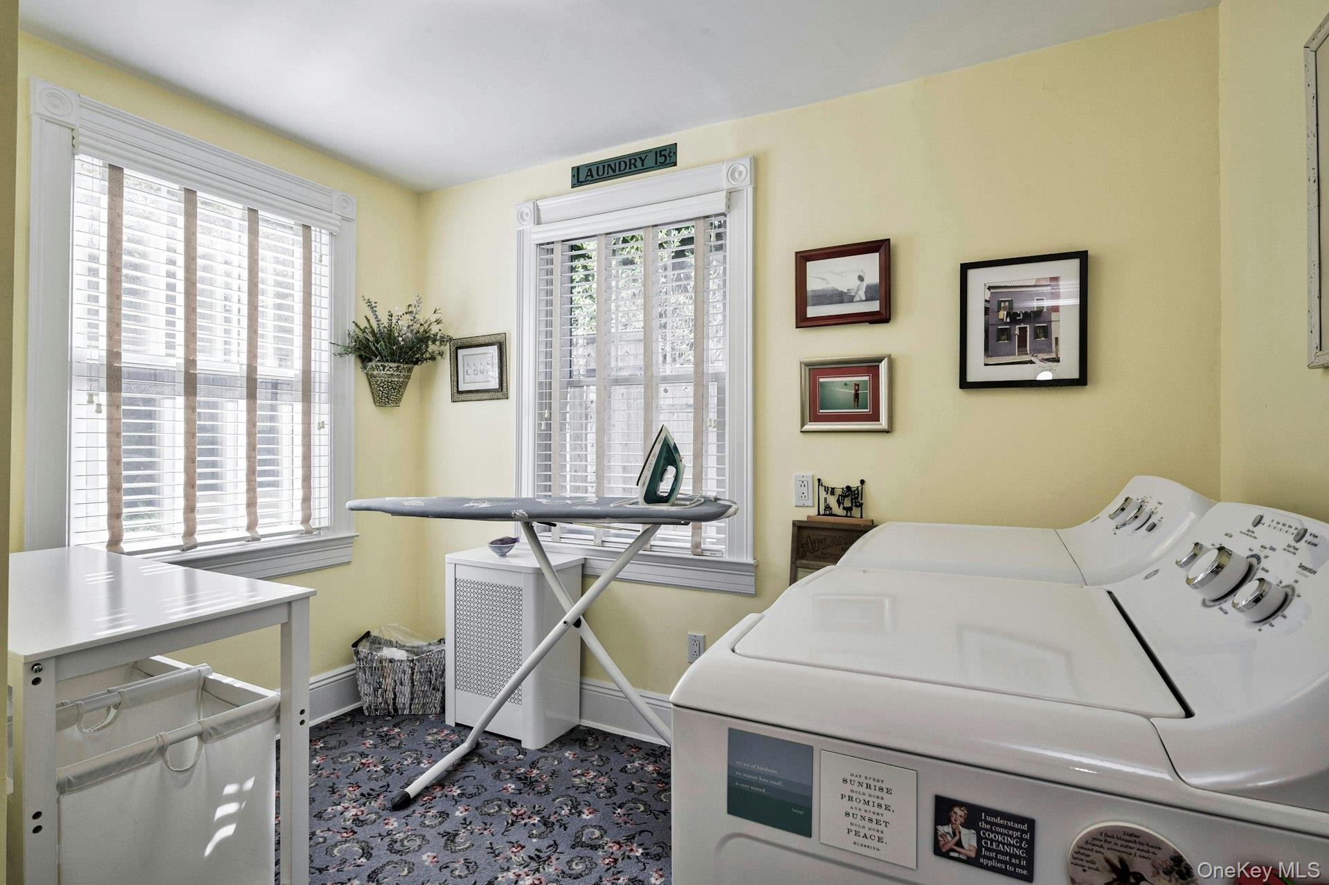 126 Cove Road Oyster Bay, NY 11771 - Photo 33 of 46 a living room with furniture a window and gym equipment