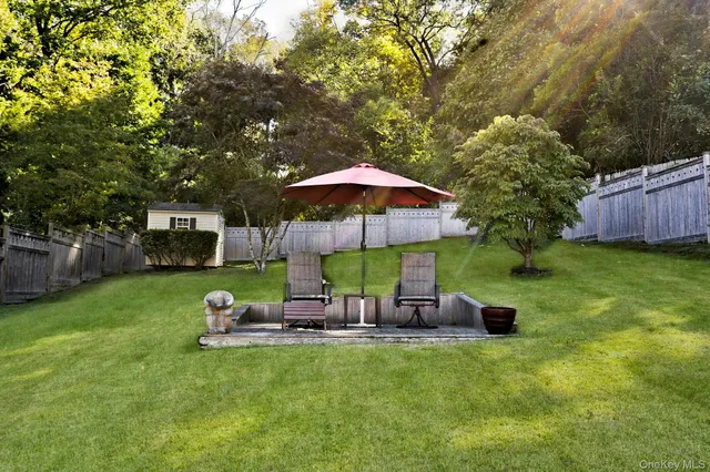 a view of an ocean and a yard