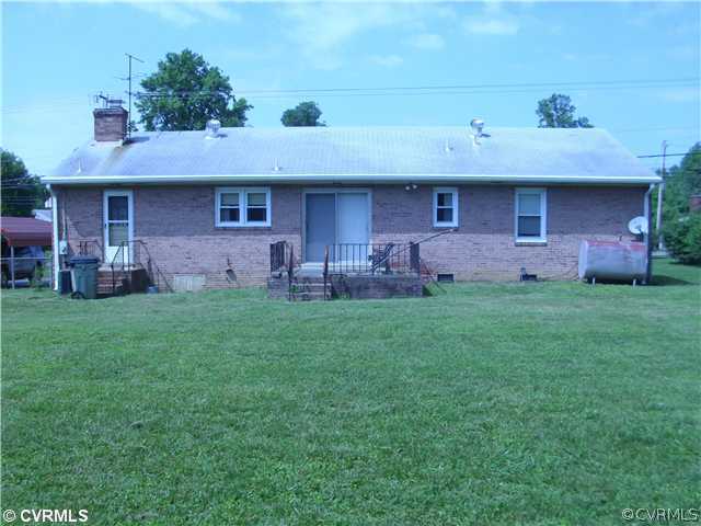 6109 Jessup Road Richmond, VA 23234 - Photo 2 of 6 Exterior Back - Large rear yard is fenced and has