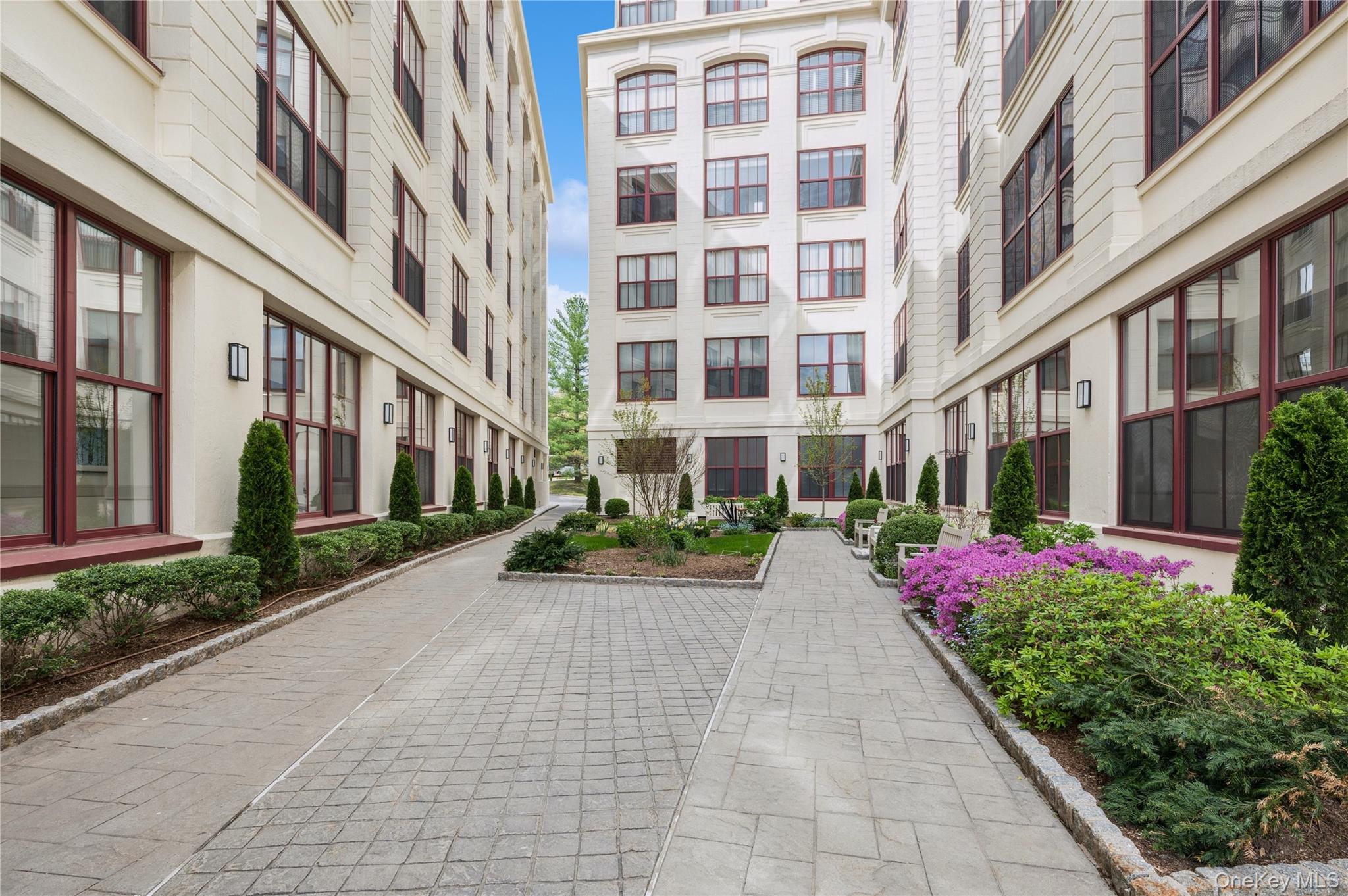 1 Scarsdale Road, Unit 613 Tuckahoe, NY 10707 - Photo 2 of 34 Beautifully landscaped courtyard view between the two buildings.