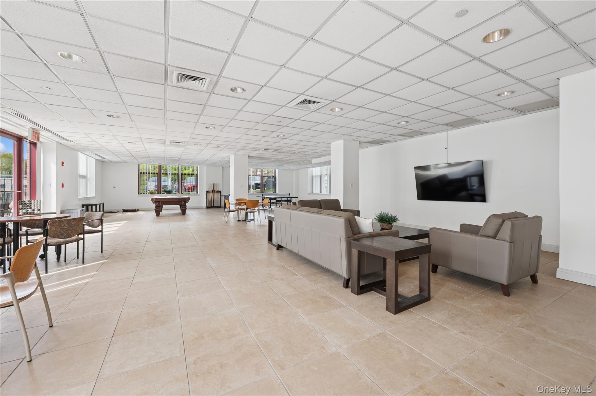1 Scarsdale Road, Unit 613 Tuckahoe, NY 10707 - Photo 24 of 34 Recreation room with access to side patio.