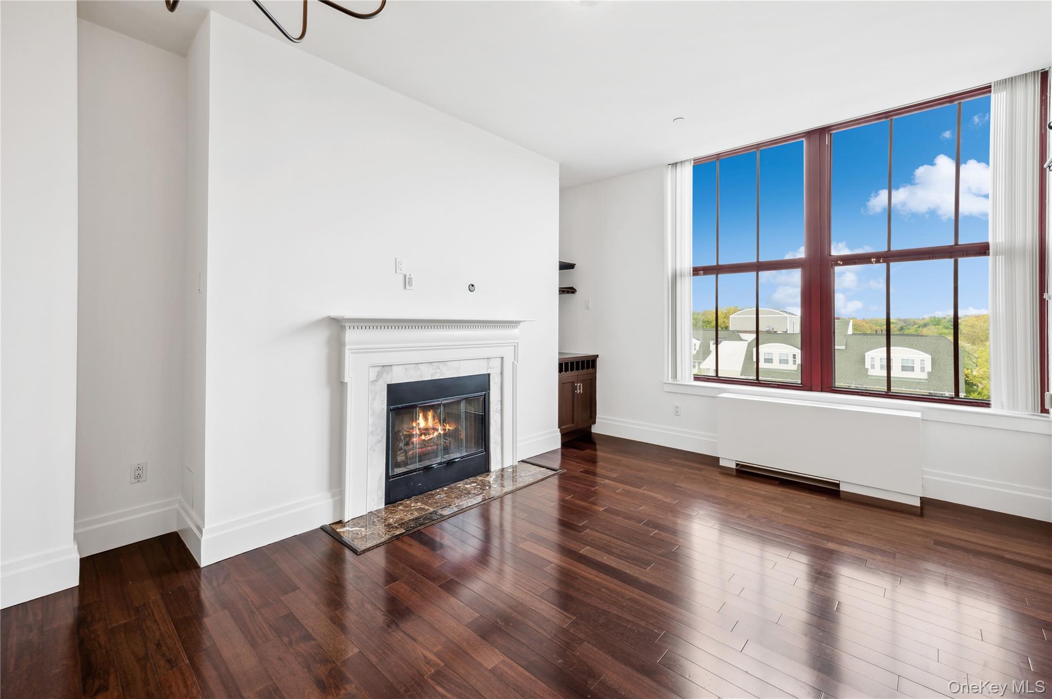 1 Scarsdale Road, Unit 613 Tuckahoe, NY 10707 - Photo 3 of 34 Living room with over-sized windows and 13' ceilings.
