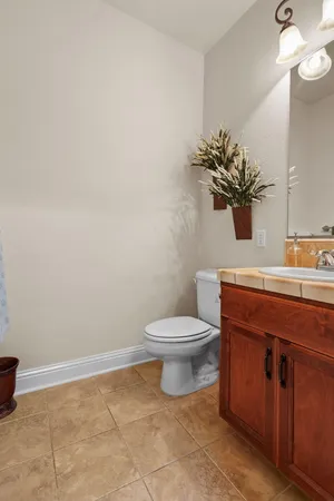 a bedroom with a bed closet and flat tv screen