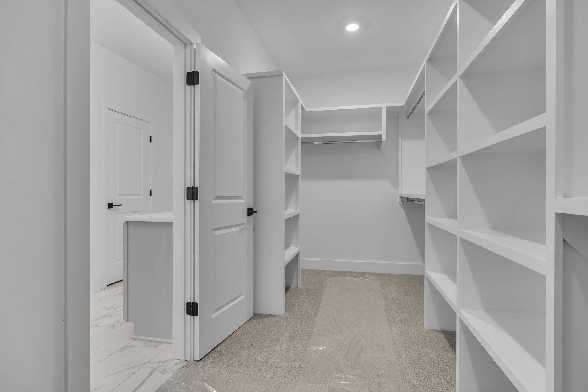 303 Noah Road Manchester, TN 37355 - Photo 36 of 63 a view of walk in closet with empty racks