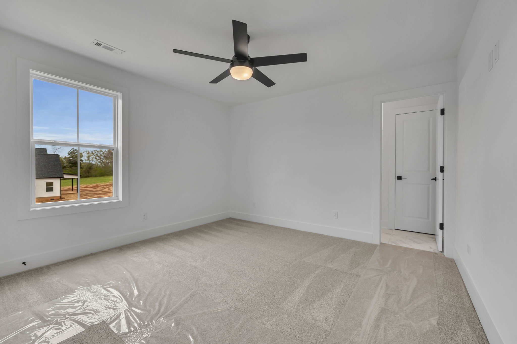 303 Noah Road Manchester, TN 37355 - Photo 37 of 63 a view of an empty room with a window