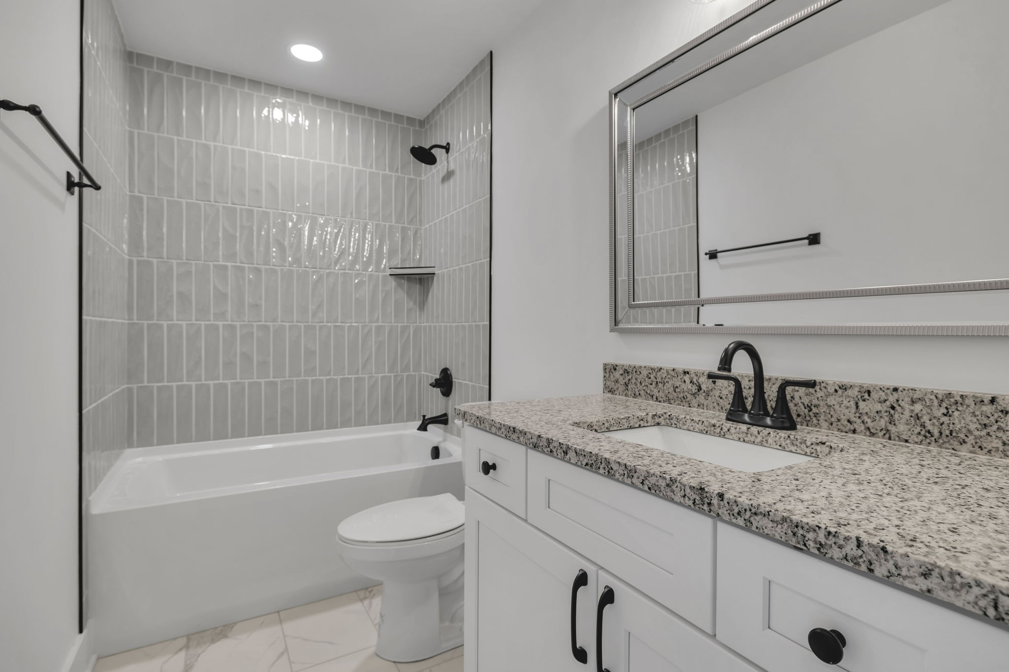 303 Noah Road Manchester, TN 37355 - Photo 39 of 63 a bathroom with a granite countertop sink a toilet and shower