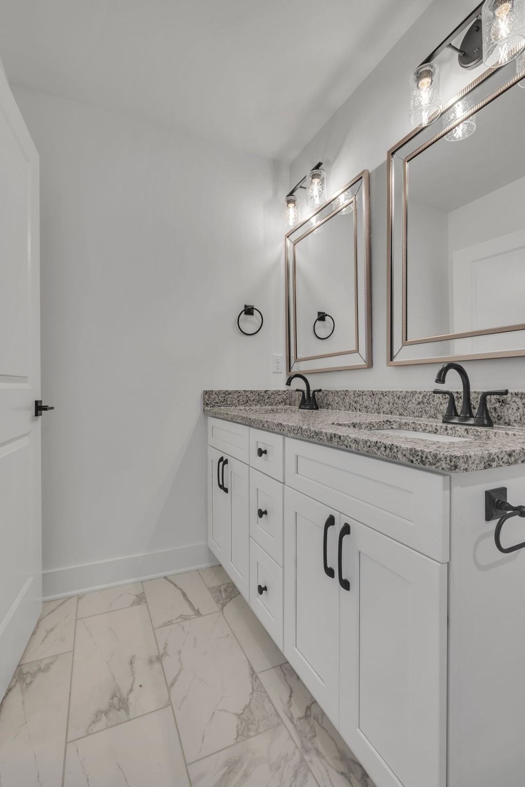 303 Noah Road Manchester, TN 37355 - Photo 44 of 63 a bathroom with a granite countertop sink and a mirror