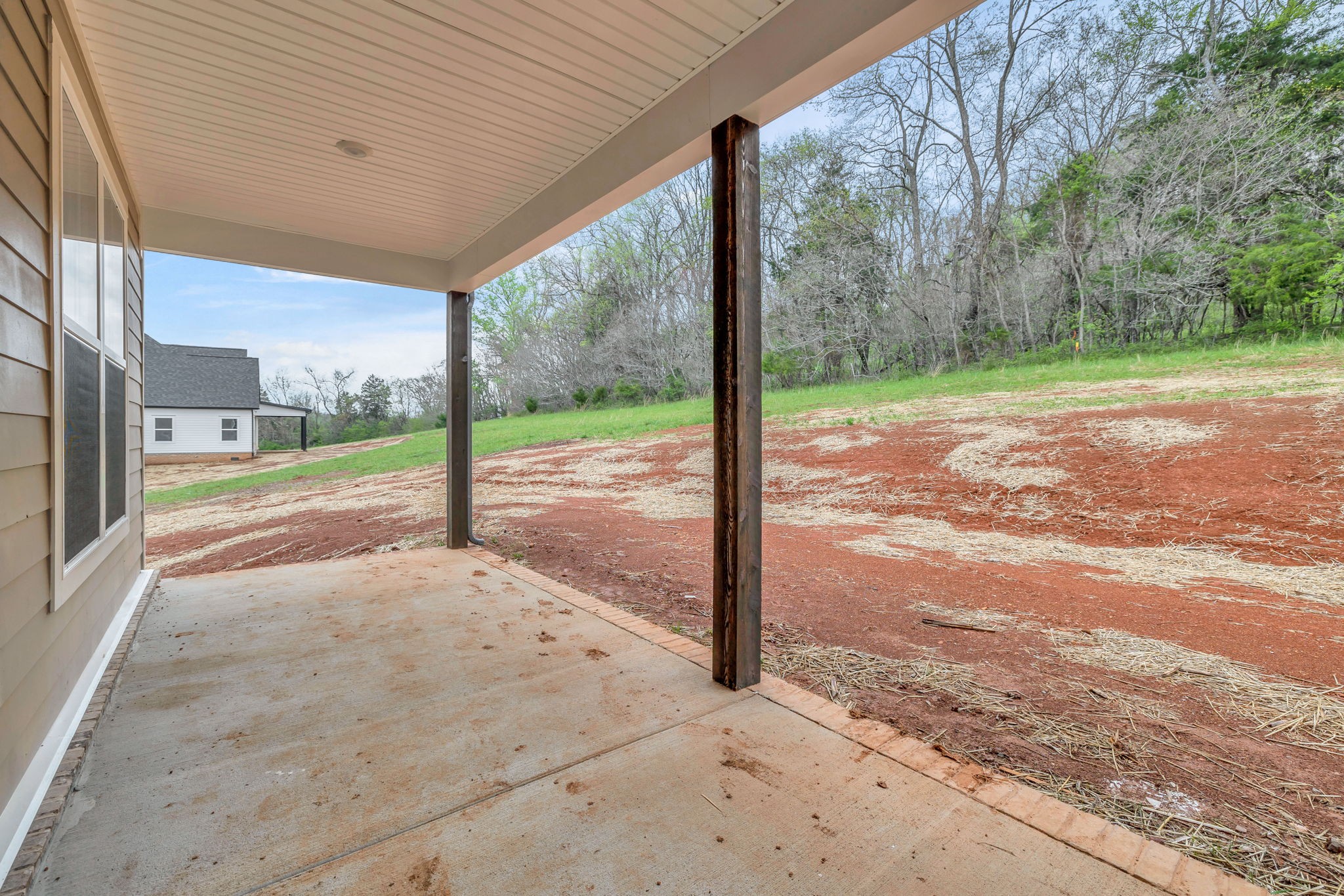 303 Noah Road Manchester, TN 37355 - Photo 51 of 63 a view of a yard with porch