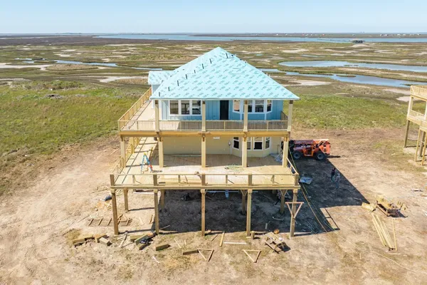 a view of a house with a ocean beach