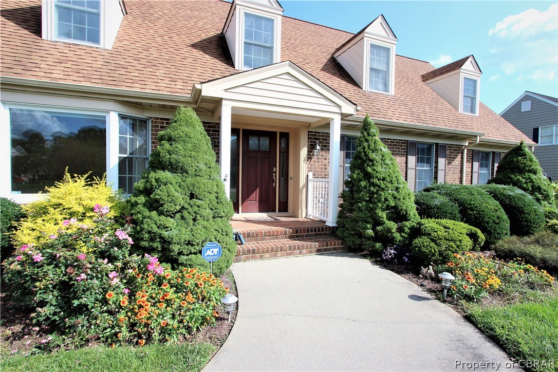 2893 Decatur Drive Hayes, VA 23072 - Photo 4 of 25 Flowering Colors and Greenery Invite You In!