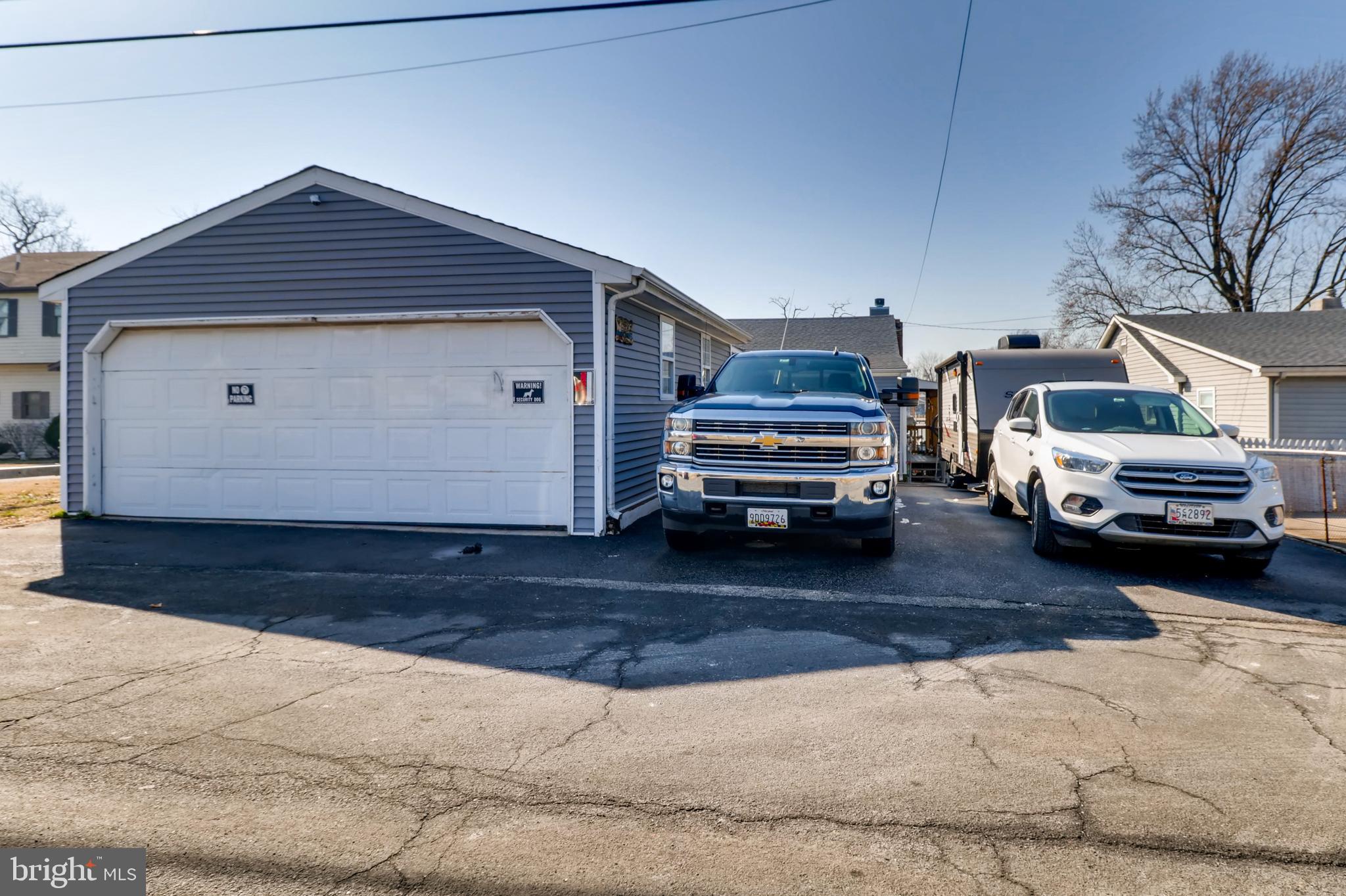 8211 Shore Road Baltimore, MD 21222 - Photo 39 of 46 Oversized garage with electric/half bath