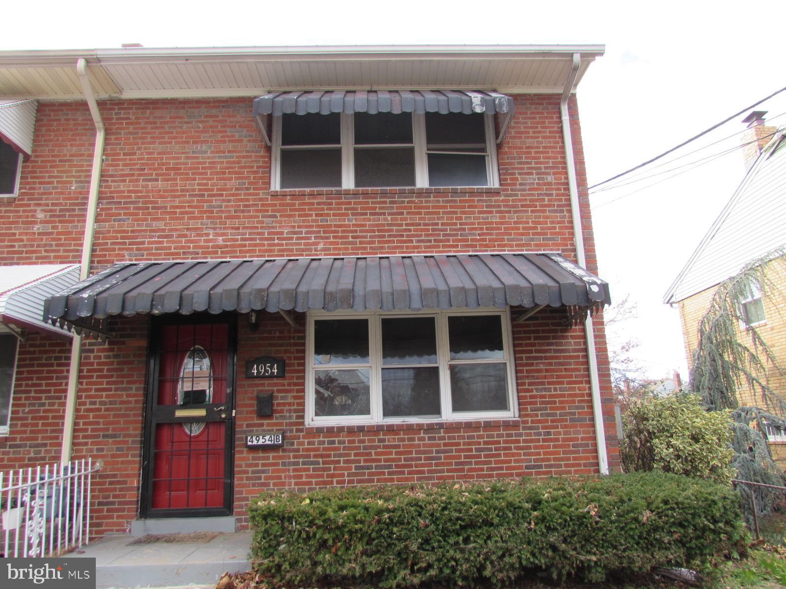 4954 8th Street Northeast Washington, DC 20017 - Photo 1 of 3 a front view of a house with glass windows