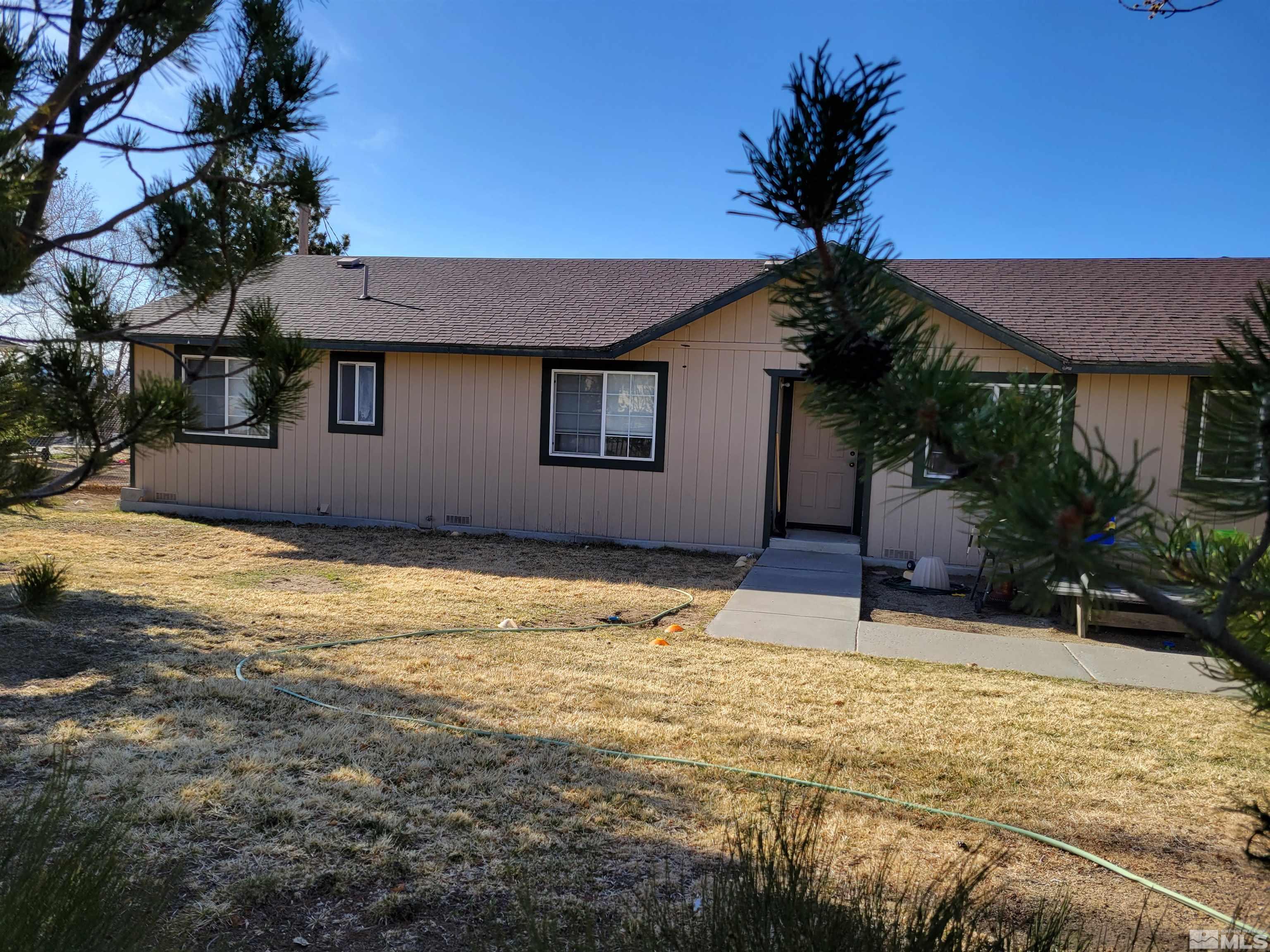10405 Bounder Lane Reno, NV 89508 - Photo 1 of 16 a house view with a outdoor space