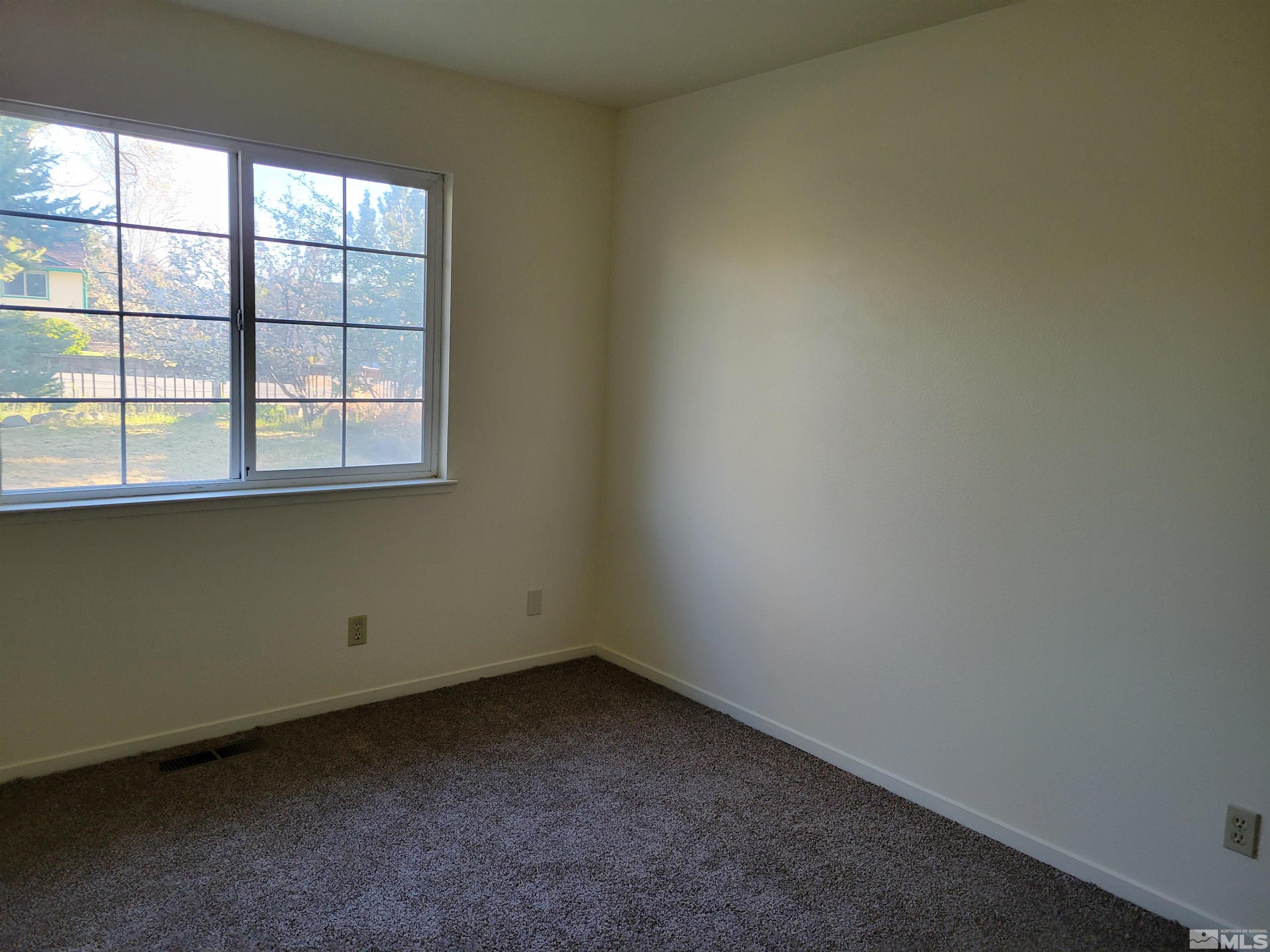 10405 Bounder Lane Reno, NV 89508 - Photo 12 of 16 an empty room with a window