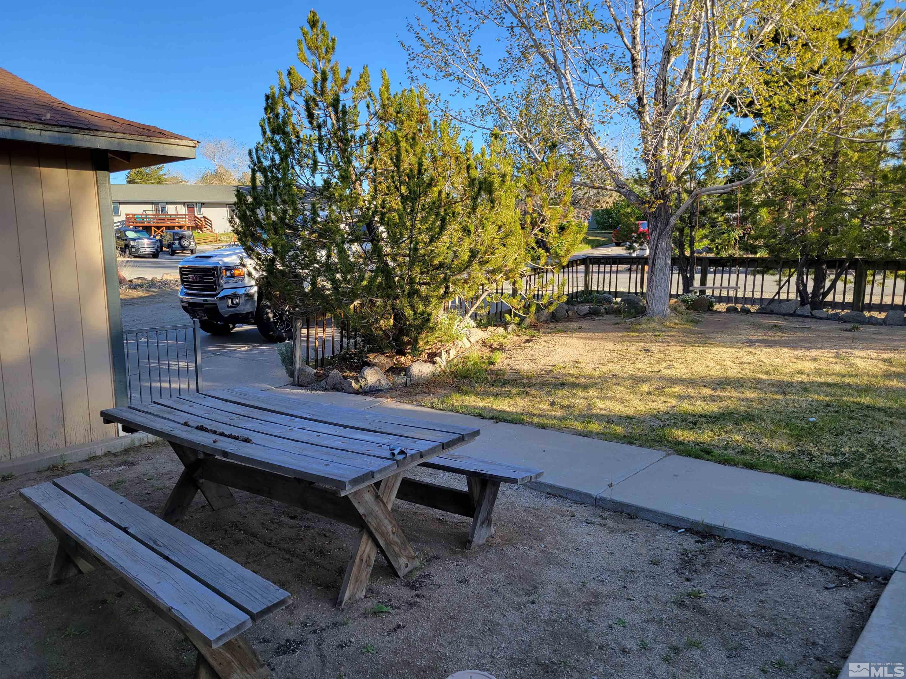 10405 Bounder Lane Reno, NV 89508 - Photo 2 of 16 a view of a outdoor sitting area with chairs