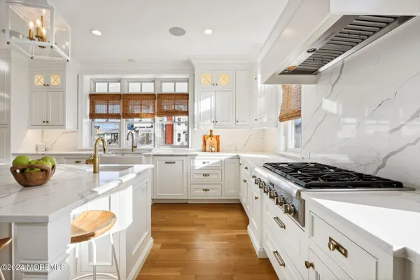 a kitchen with a table and chairs in it