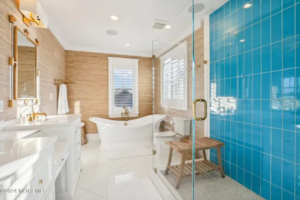 a living room with wooden floor and furniture