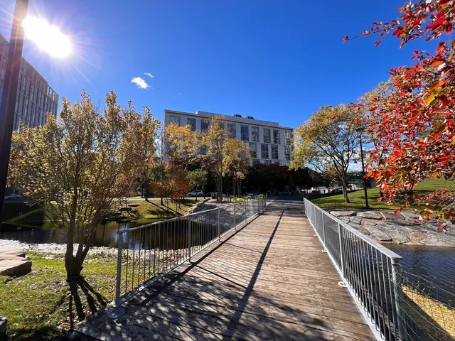 a view of a street with cars