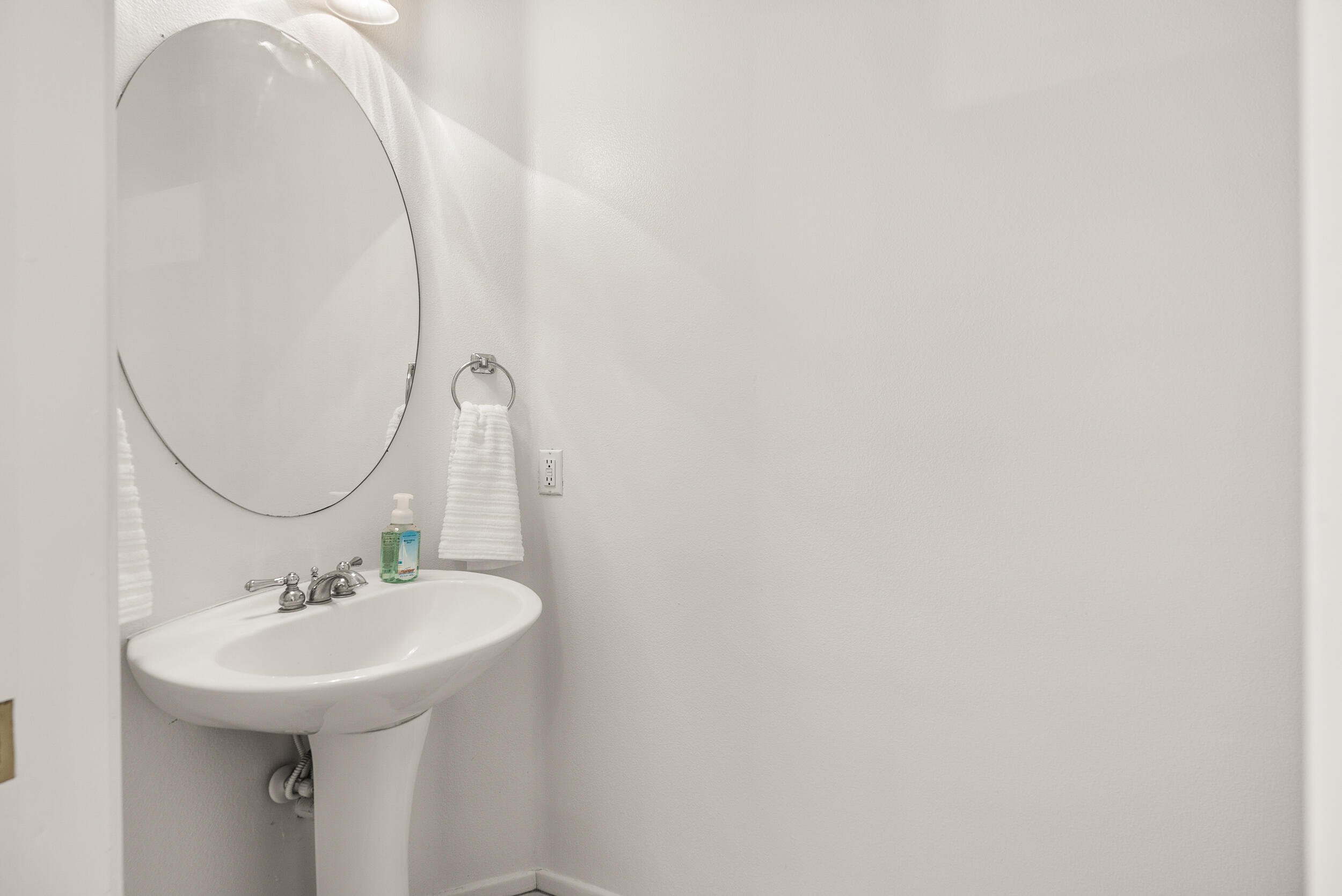 25803 Hammet Circle Stevenson Ranch, CA 91381 - Photo 16 of 32 a bathroom with a sink and a mirror