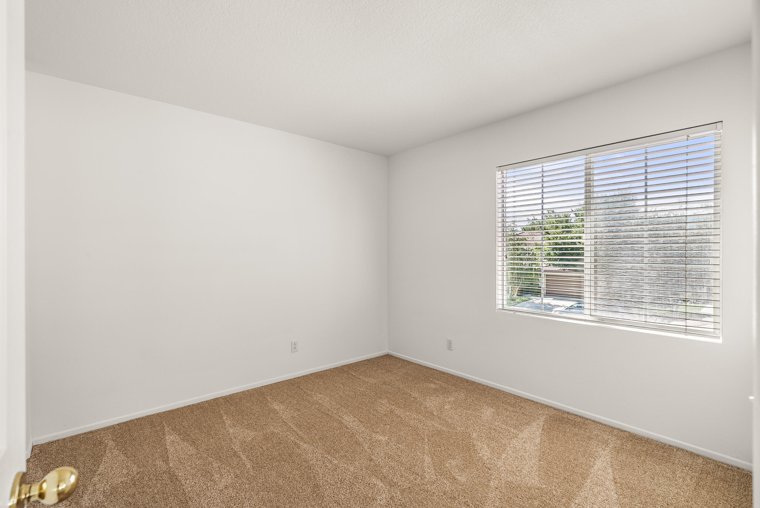 25803 Hammet Circle Stevenson Ranch, CA 91381 - Photo 25 of 32 a view of an empty room with a window