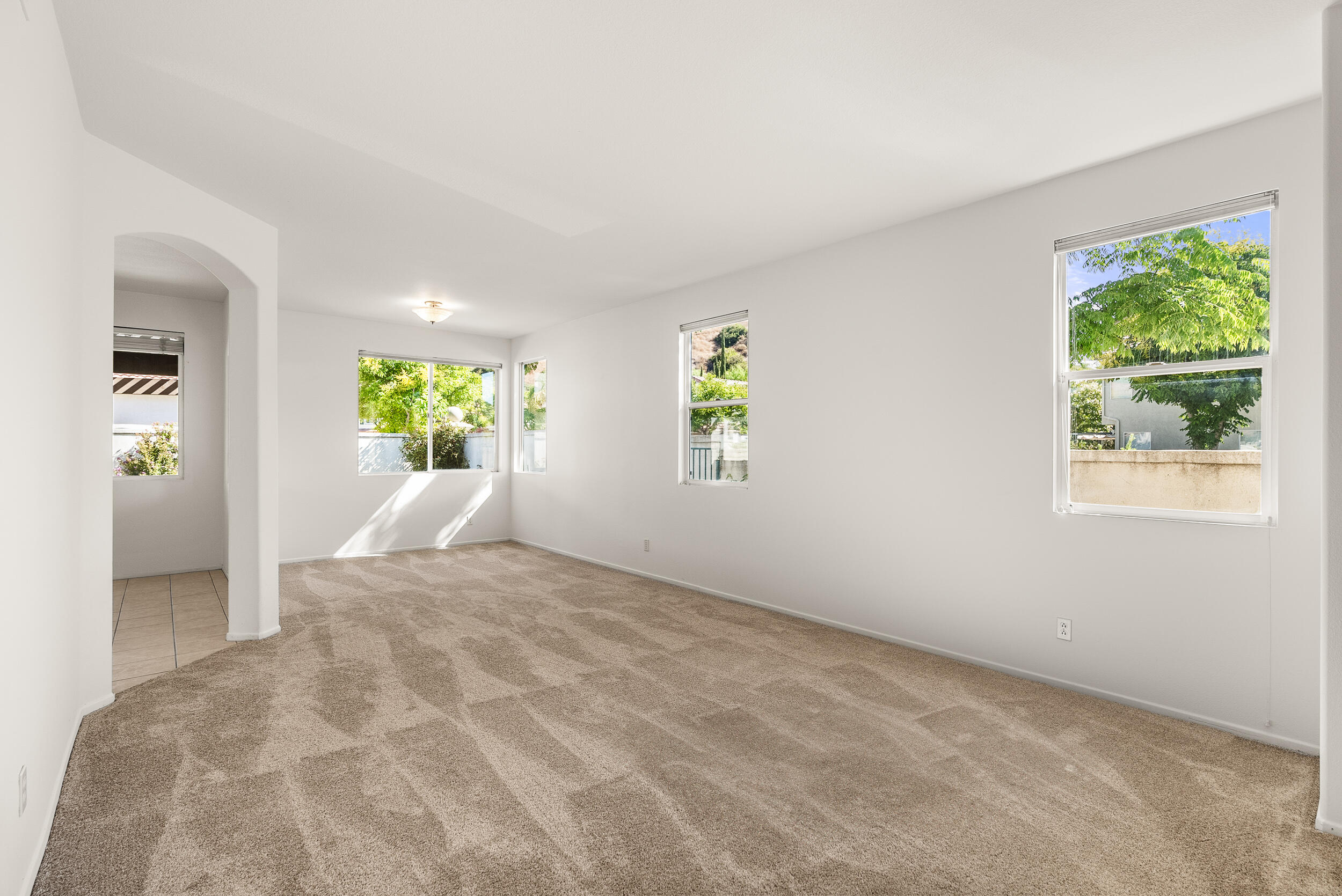 25803 Hammet Circle Stevenson Ranch, CA 91381 - Photo 5 of 32 a view of an empty room with a window
