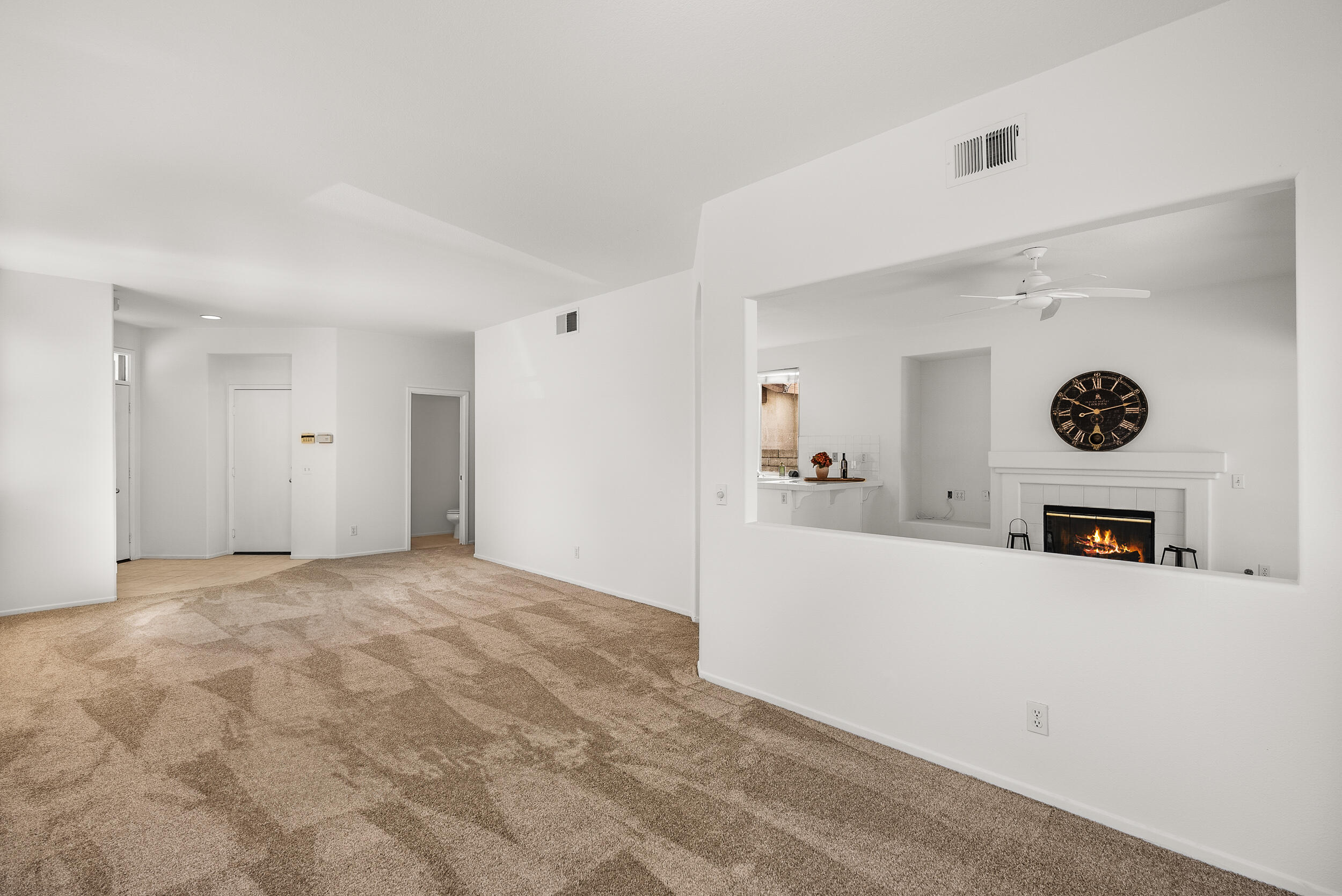 25803 Hammet Circle Stevenson Ranch, CA 91381 - Photo 8 of 32 a view of a kitchen with a microwave and a refrigerator