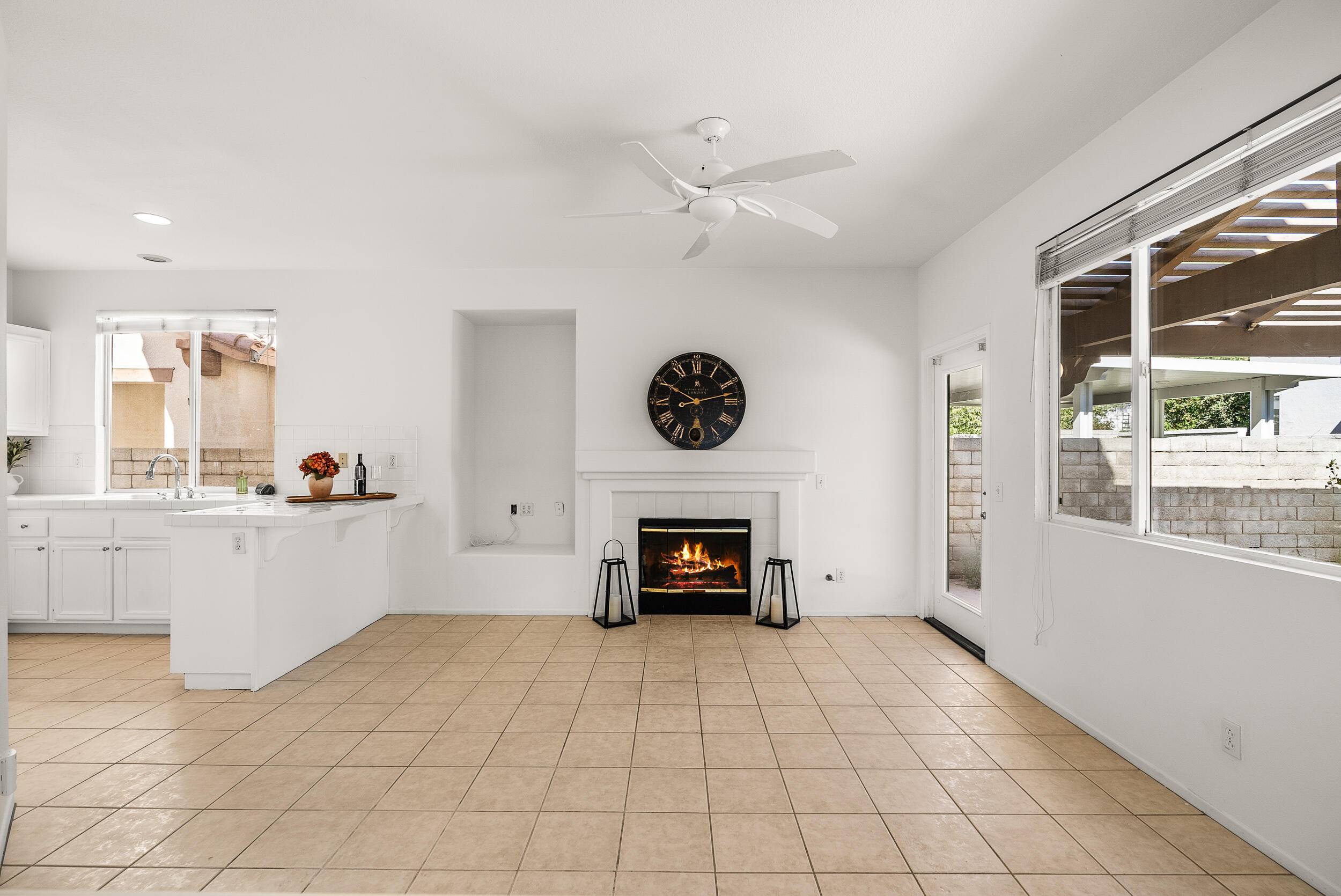 25803 Hammet Circle Stevenson Ranch, CA 91381 - Photo 9 of 32 a living room with furniture and a fireplace