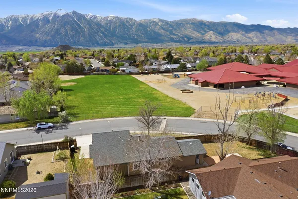 an aerial view of a house with garden space and outdoor space