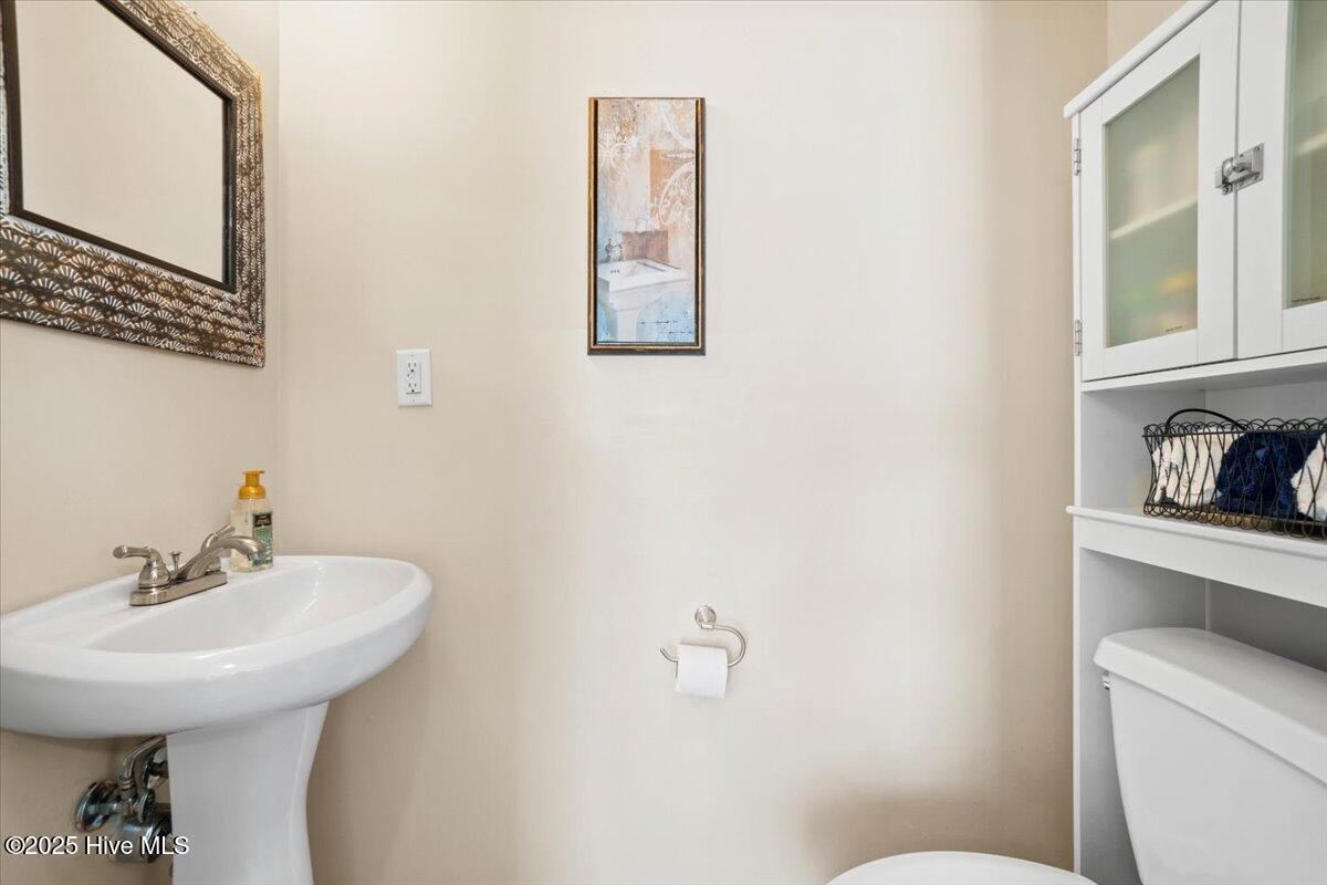 7650 Front Street, Unit 3 Sunset Beach, NC 28468 - Photo 11 of 37 Downstairs Half Bath