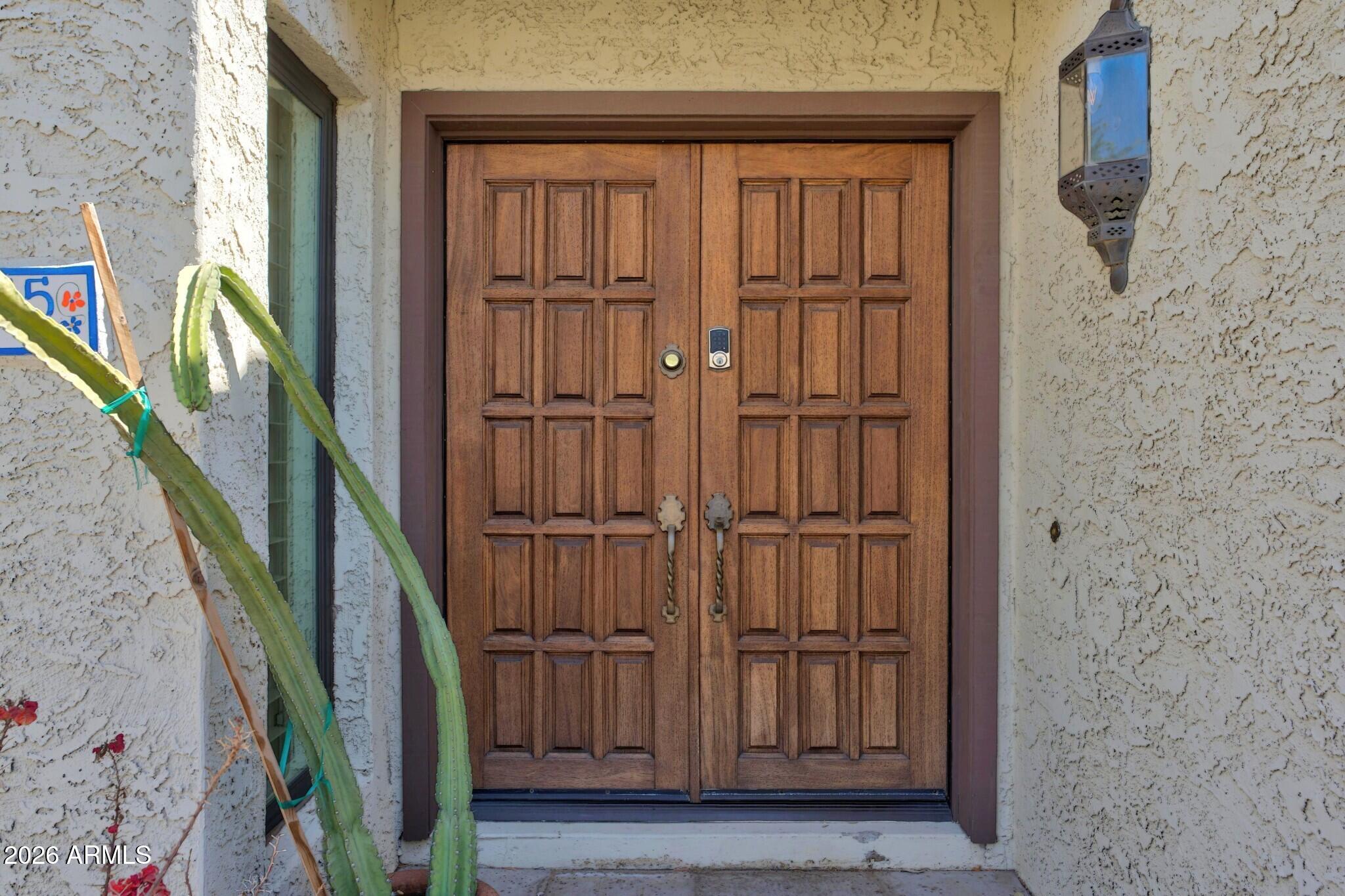 4615 East Monte Way Phoenix, AZ 85044 - Photo 5 of 35 a view of front door with hallway