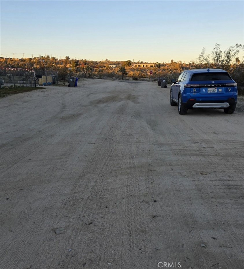 6295 Ruth Drive Yucca Valley, CA 92284 - Photo 2 of 4 a car parked on the side of a road