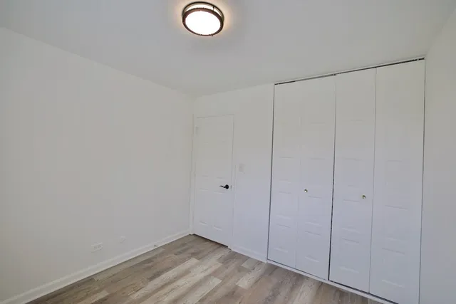 a view of a livingroom with wooden floor