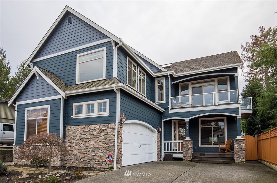 907 North 35th Street Renton, WA 98056 - Photo 1 of 37 a front view of a house with garage